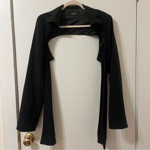 Black bolero with padded shoulders and coattails
